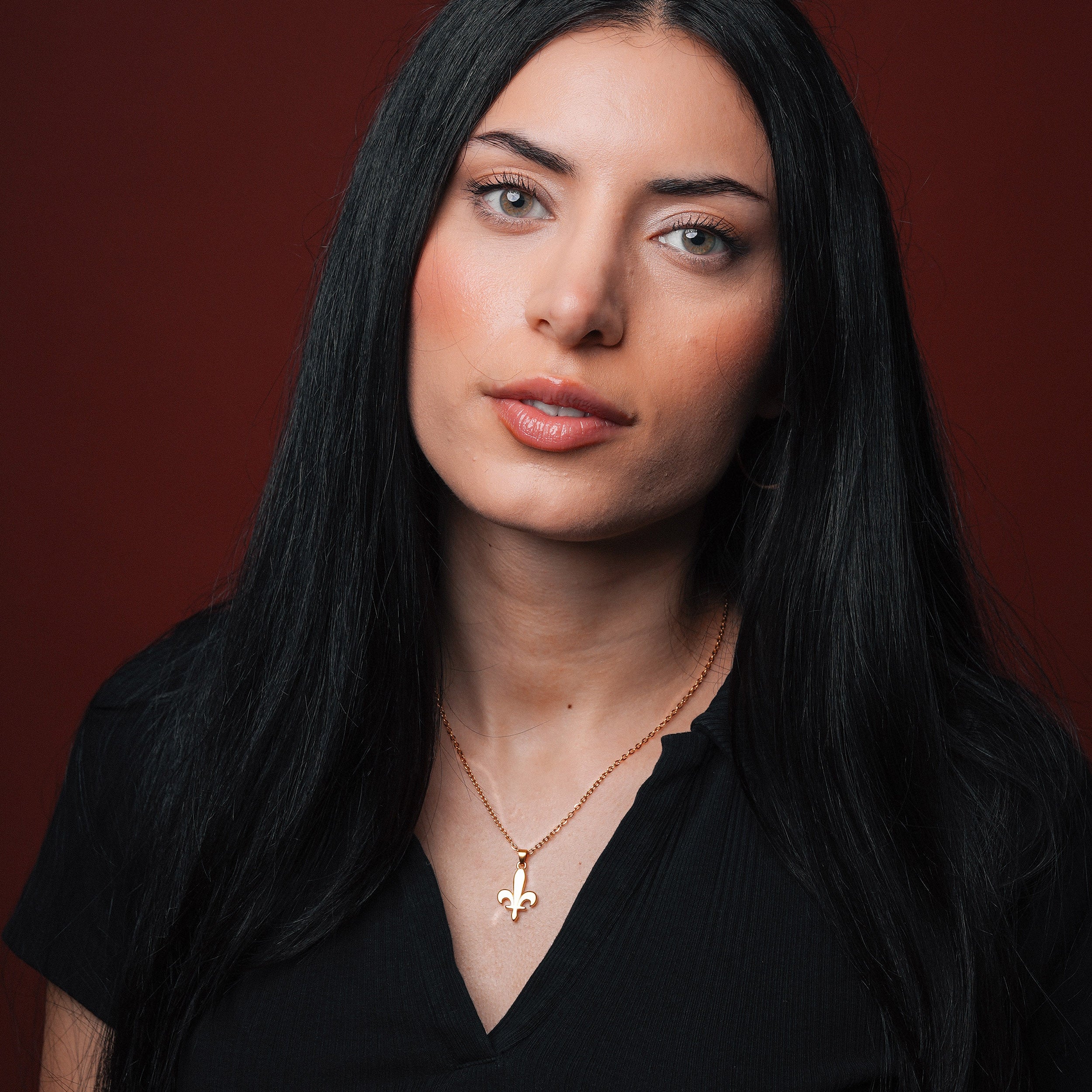 Gold Bosnia Ljiljan necklace with lily pendant, worn by model for BLKN®